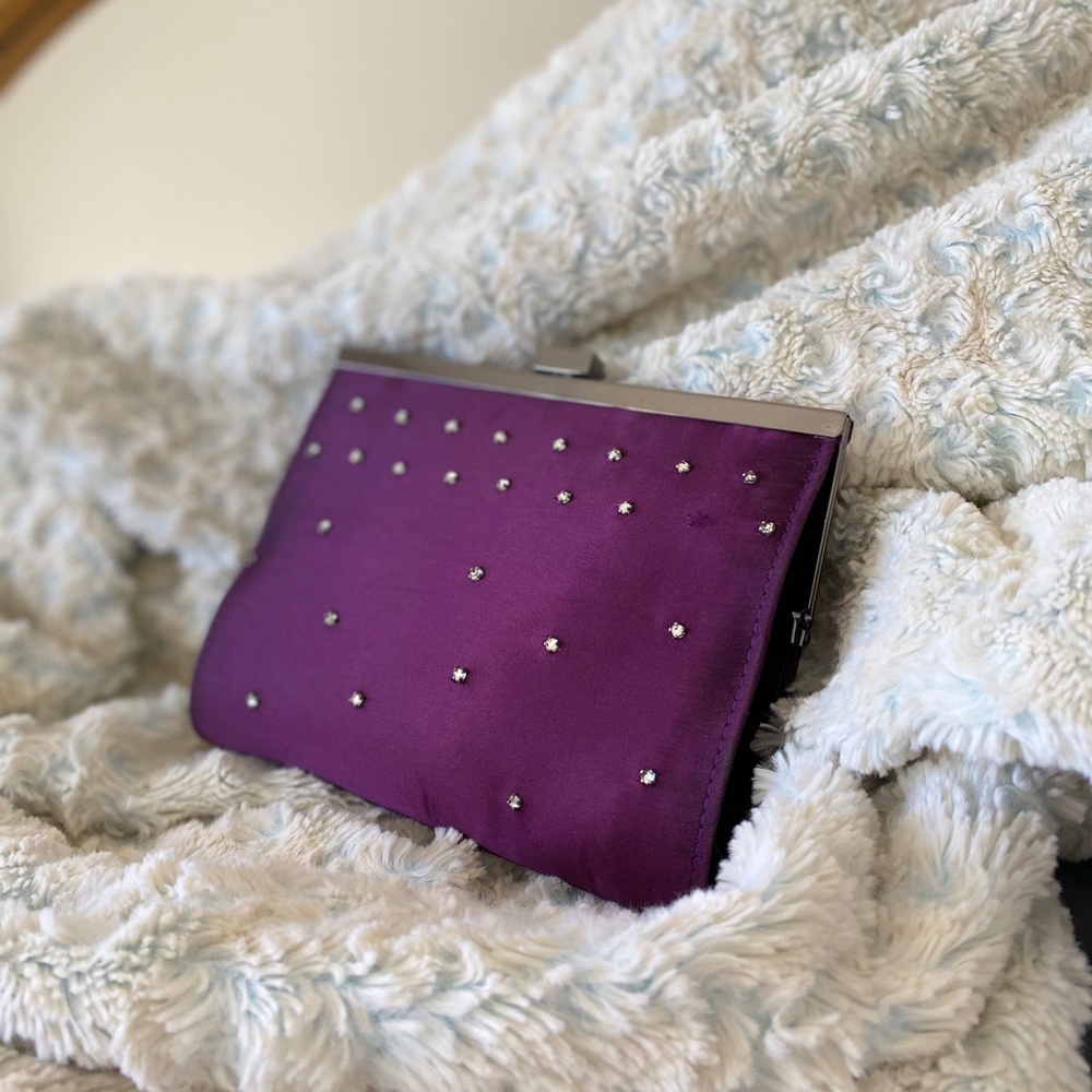 Purple chained purse with rhinestones